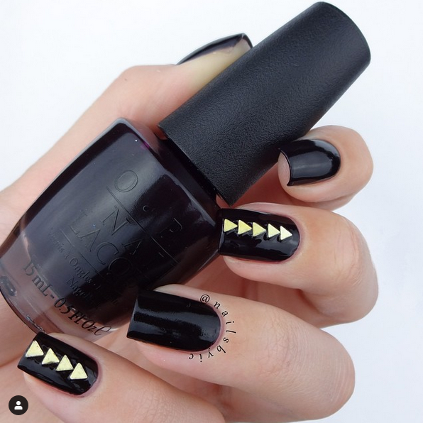 Black and gold stud nails