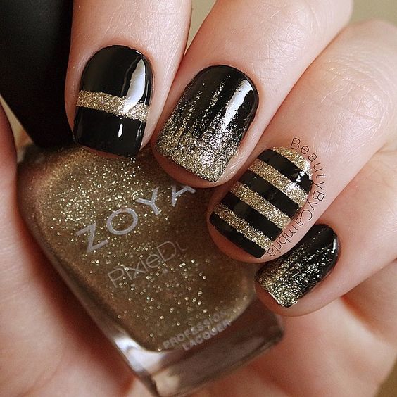 Black and rose gold metallic nail art