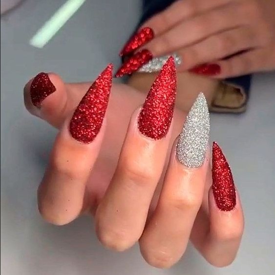 Red stiletto glitter nails